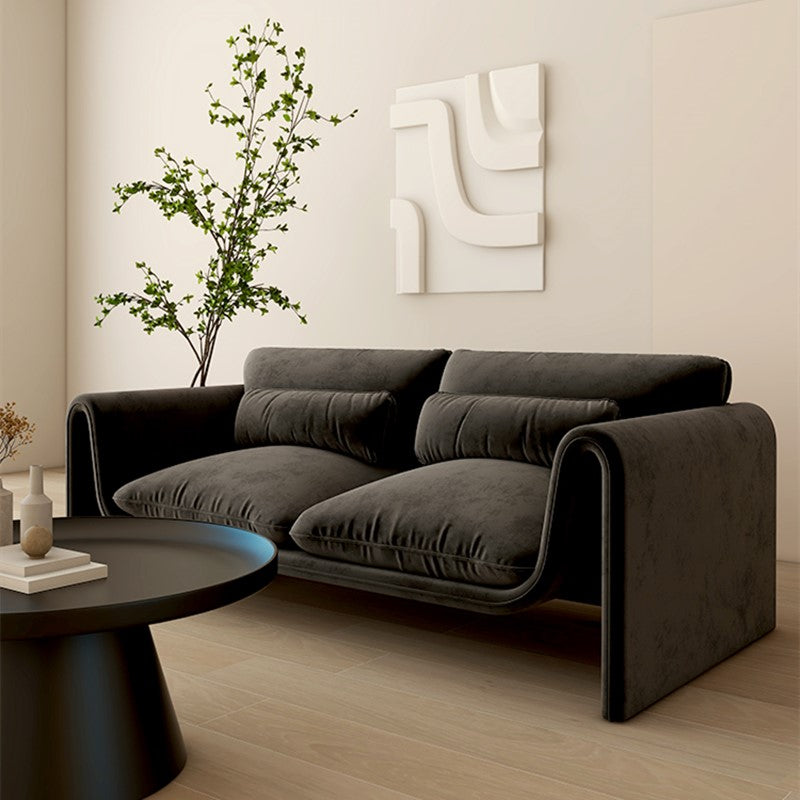 Modern Black Velvet Sofa with Sculptural Rolled Arms a€?Designer 2-Seater Couch for Minimalist and Luxury Interiors