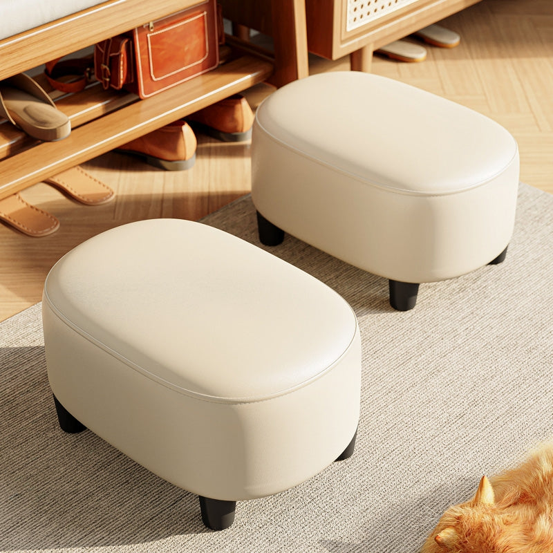 Minimalist Oval Ottoman Footstool with Faux Leather Upholstery and Wood Legs for Bedroom Entryway or Living Room Use