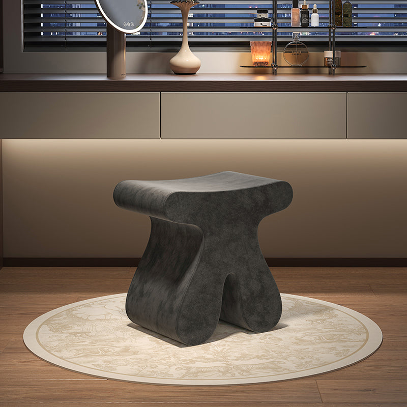 Modern Sculptural Vanity Stool in Charcoal Faux Suede with Curved Silhouette for Bedroom Dressing Area or Artistic Accent Seating