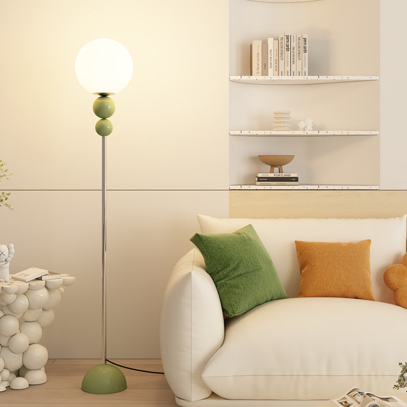 Modern Globe Floor Lamp with Glossy Green Accent Balls and White Glass Shade for Living Room Bedroom or Creative Studio