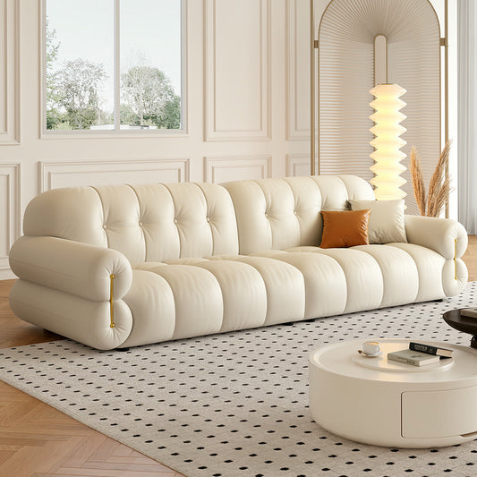 Cream Tufted Leather Sofa a€?Vintage-Inspired Puffy 3-Seater with Rolled Arms and Gold Accents