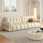 Cream Tufted Leather Sofa a€?Vintage-Inspired Puffy 3-Seater with Rolled Arms and Gold Accents