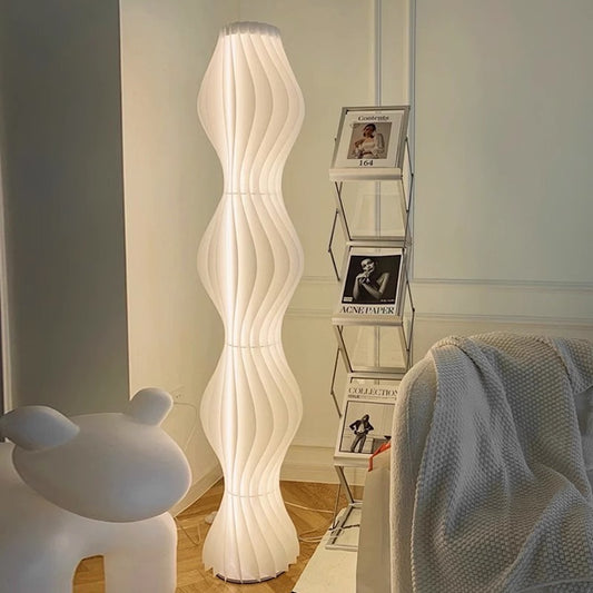 Modern Sculptural Floor Lamp with Wave Shaped Design and Soft White Glow for Living Room or Studio Decor