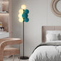 Modern Cluster Globe Floor Lamp with Teal and White Spheres on Black Stand for Bedroom or Creative Living Spaces