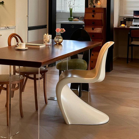 Modern Curved Dining Chair in White Molded Plastic with Sculptural S Shape for Contemporary Dining Room or Artistic Accent Seating