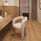 Modern Minimalist Cream Accent Chair with Curved Padded Frame and Upholstered Seat for Home Office, Vanity, or Lounge Space