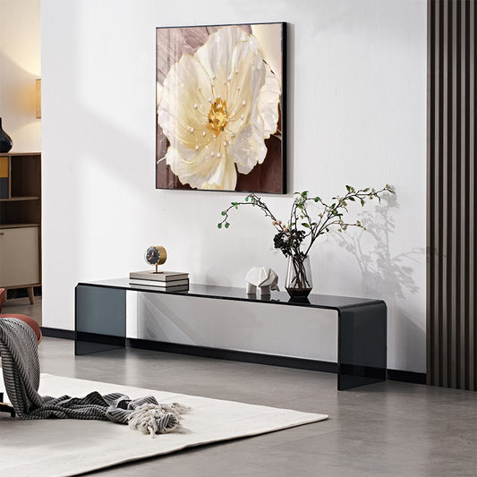 Minimalist Black Glass TV Stand with Curved Corners and Transparent Design for Modern Art-Inspired Living Spaces