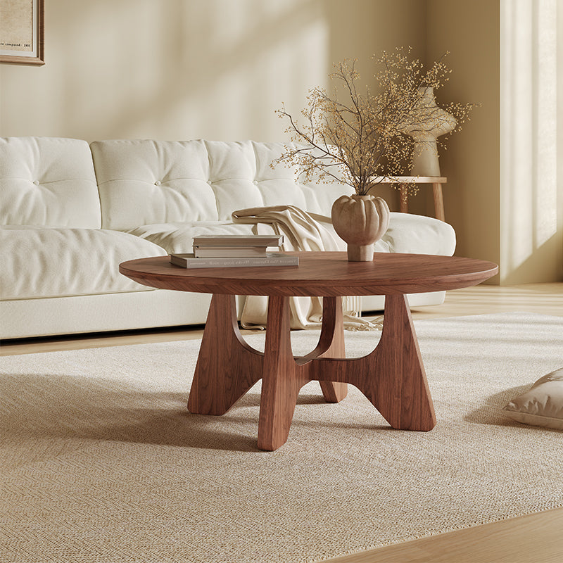 Mid Century Round Wooden Coffee Table with Sculpted Solid Wood Base and Walnut Finish for Living Room or Lounge Seating Area