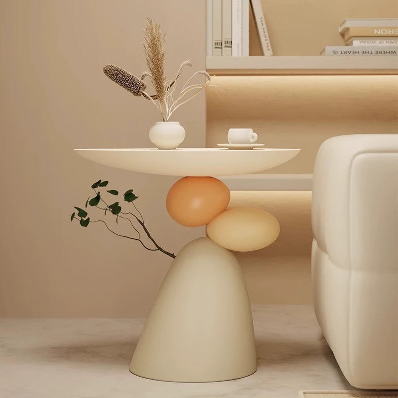 Modern Sculptural Side Table with Pebble Base and Soft Round Top for Living Room or Creative Interior Style