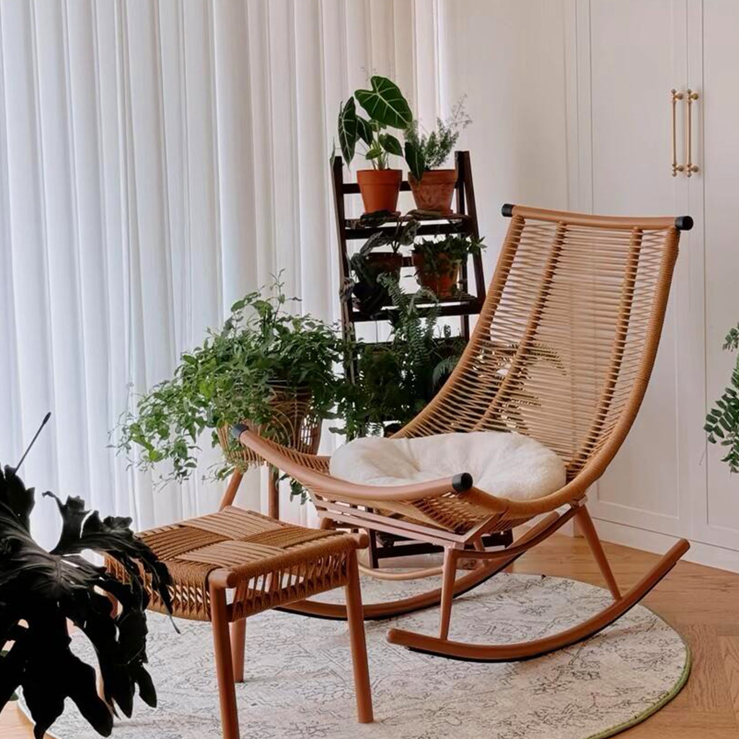 Minimalist Rattan Rocking Chair with Footrest and Cushion a€?Boho Lounge Chair for Balcony, Reading Nook, or Indoor Garden