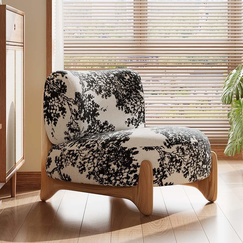 Modern Low Lounge Chair with Ink-Inspired Black & White Upholstery and Curved Wood Frame for Living Room or Reading Nook