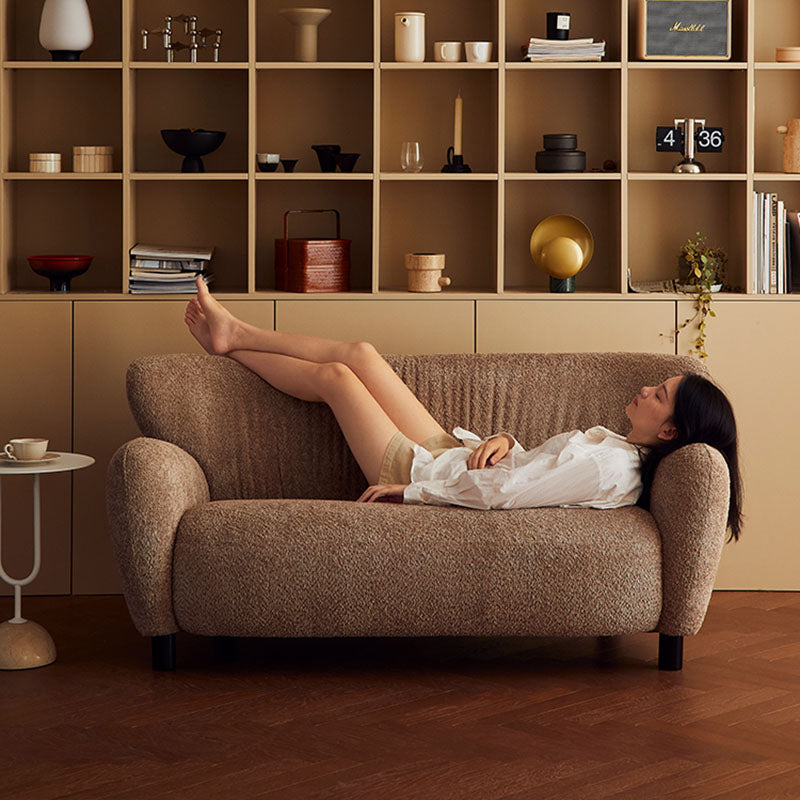 Cozy Curved Sofa in Textured Fabric with Rounded Arms a€?Minimalist 2-Seater Couch for Japandi, Wabi-Sabi, or Modern Interiors
