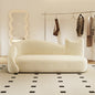 Asymmetrical Cream Modern Sofa with Sculptural Silhouette a€?Artistic 3-Seater Couch for Boutique Interiors & Creative Spaces