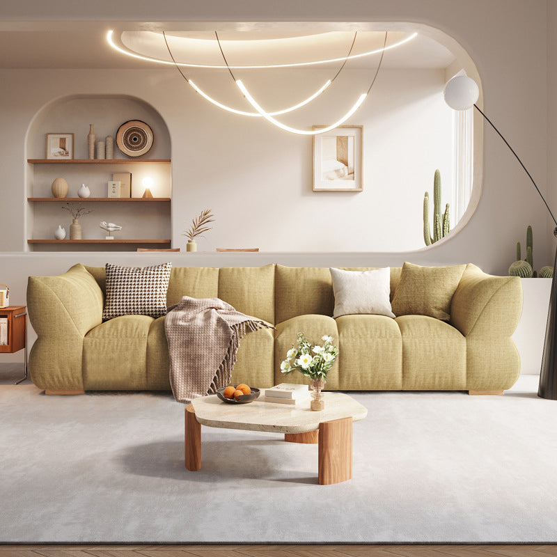 Modern Curved Sofa in Mustard Linen a€?Plush 4-Seater with Sculpted Silhouette and Soft Fabric Upholstery